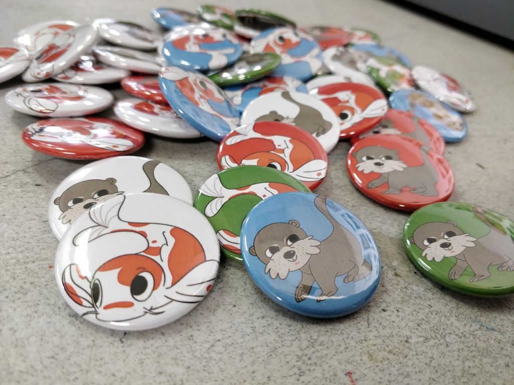 Team Otter and Team Koi buttons